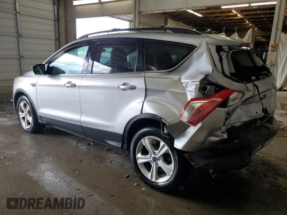 2013 Ford Escape SE with VIN 1FMCU9GX3DUD32274, listed as a Copart auction lot 63778235 with 161,288 mi miles and Salvage title. Bid and sale history available at DreamBid. Image 2.