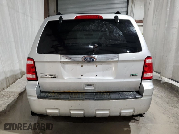 2010 Ford Escape Limited с VIN 1FMCU9EG1AKC84297, выставлен на аукционе Copart как лот 56038215 с пробегом 62 504 миль миль и Списание • Salvage title. История ставок и продаж доступна на DreamBid. Изображение 6.