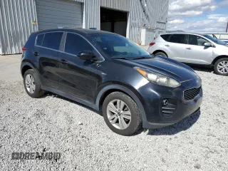 2018 Kia Sportage LX with VIN KNDPMCAC8J7316512, listed as a Copart auction lot 47143515 with 117,147 mi miles and Salvage Title. Bid and sale history available at DreamBid. Image 4.