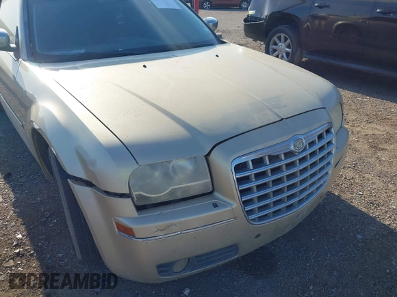 2010 Chrysler 300 Touring with VIN 2C3CA5CV0AH167992, listed as a IAAI auction lot 41985352 with 235,816 mi miles. Bid and sale history available at carsss.com. Image 6.