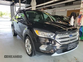 2019 Ford Escape Titanium with VIN 1FMCU9J96KUA01051, listed as a IAAI auction lot 42841649 with 69,720 mi miles and . Bid and sale history available at DreamBid. Image 4.