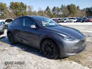 2023 Tesla Model Y Long Range with VIN 7SAYGDEE8PF889879, listed as a Copart auction lot 46115535 with 17,818 mi miles and Salvage Title. Bid and sale history available at DreamBid. Image 4.