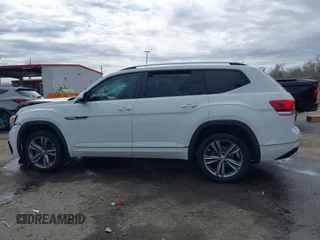 2019 Volkswagen Atlas SEL R-Line with VIN 1V2RR2CA6KC594588, listed as a IAAI auction lot 41686713 with 125,180 mi miles and . Bid and sale history available at DreamBid. Image 14.
