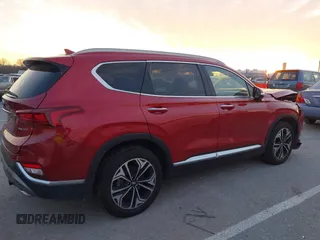 2019 Hyundai Santa Fe Ultimate with VIN 5NMS5CAA4KH105145, listed as a IAAI auction lot 41156214 with 54,796 mi miles and . Bid and sale history available at DreamBid. Image 14.