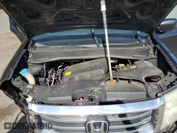 2012 Honda Pilot EX-L z VIN 5FNYF4H56CB051453, wystawiony jako Copart lot #56736035 z przebiegiem 210 201 mil mil oraz Szkoda całkowita • Salvage title. Historia ofert i sprzedaży dostępna na DreamBid. Obrazek 12.