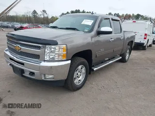 2013 Chevrolet Silverado 1500 LT with VIN 3GCPKSE74DG332907, listed as a IAAI auction lot 41951755 with 214,211 mi miles. Bid and sale history available at carsss.com. Image 17.