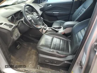 2013 Ford Escape SEL z VIN 1FMCU9H9XDUD00146, wystawiony jako Copart lot #60886165 z przebiegiem 198 557 mil mil oraz Szkoda całkowita • Salvage title. Historia ofert i sprzedaży dostępna na DreamBid. Obrazek 7.