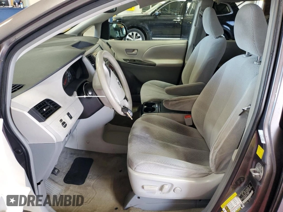 2011 Toyota Sienna LE AAS with VIN 5TDKK3DC8BS117009, listed as a Copart auction lot 56035065 with 148,160 mi miles and Salvage Title. Bid and sale history available at DreamBid. Image 7.