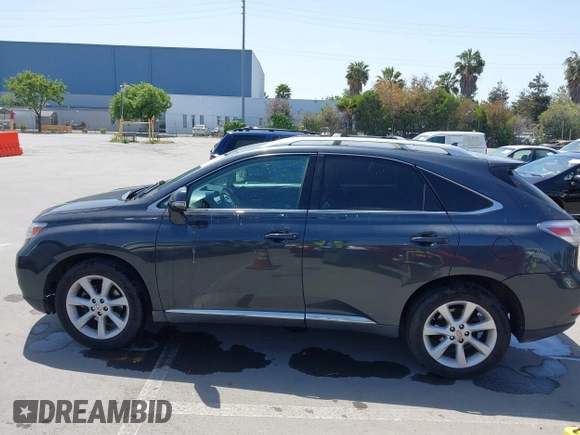 2010 Lexus RX 350 with VIN 2T2BK1BA8AC061209, listed as a IAAI auction lot 42105424 with 242,961 mi miles. Bid and sale history available at carsss.com. Image 14.