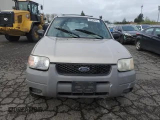 2001 Ford Escape XLS with VIN 1FMYU02111KA37010, listed as a Copart auction lot 52328415 with 312,425 mi miles and Salvage title. Bid and sale history available at DreamBid. Image 5.