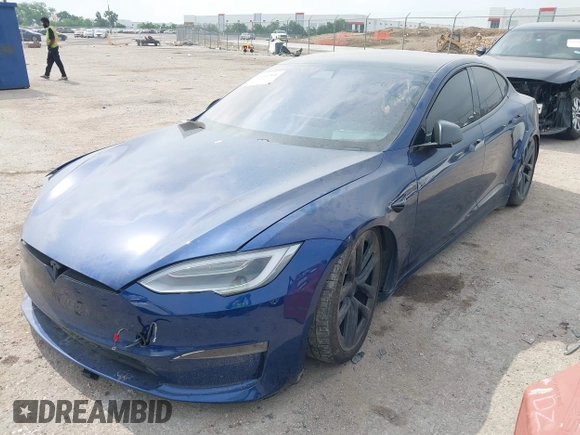 2021 Tesla Model S Plaid with VIN 5YJSA1E64MF442036, listed as a IAAI auction lot 42141304 with 24,998 mi miles and . Bid and sale history available at DreamBid. Image 18.