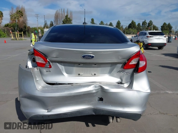 2012 Ford Fiesta SE with VIN 3FADP4BJ2CM150953, listed as a IAAI auction lot 42010904 with 77,637 mi miles. Bid and sale history available at carsss.com. Image 16.
