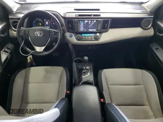 2016 Toyota RAV4 Hybrid XLE with VIN JTMRJREV0GD035203, listed as a Copart auction lot 54300225 with 153,369 mi miles and Salvage Title. Bid and sale history available at carsss.com. Image 8.