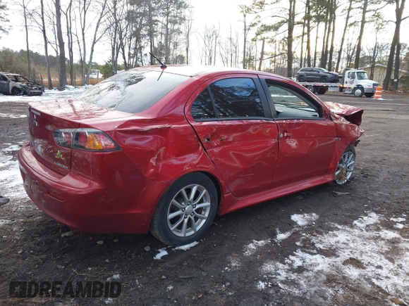 2016 Mitsubishi Lancer SE with VIN JA32V2FW7GU004159, listed as a IAAI auction lot 41401386 with 100,536 mi miles. Bid and sale history available at carsss.com. Image 4.