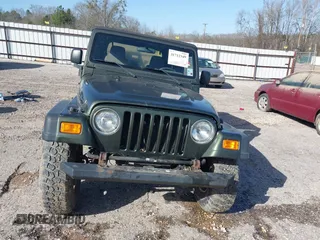 2006 Jeep Wrangler Rubicon z VIN 1J4FA69SX6P788424, wystawiony jako IAAI lot #41712349 z przebiegiem 121 684 mil mil oraz . Historia ofert i sprzedaży dostępna na DreamBid. Obrazek 13.