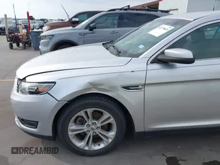 2015 Ford Taurus SEL z VIN 1FAHP2E88FG133328, wystawiony jako IAAI lot #42179649 z przebiegiem 127 171 mil mil oraz . Historia ofert i sprzedaży dostępna na DreamBid. Obrazek 6.