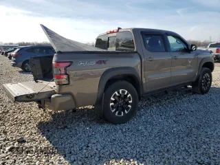 2024 Nissan Frontier SL with VIN 1N6ED1EK9RN657838, listed as a Copart auction lot 42253895 with 10,012 mi miles and Salvage title. Bid and sale history available at DreamBid. Image 3.