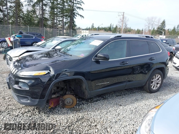 2014 Jeep Cherokee Latitude with VIN 1C4PJMCS0EW169696, listed as a IAAI auction lot 41647691 with 98,919 mi miles. Bid and sale history available at carsss.com. Image 15.