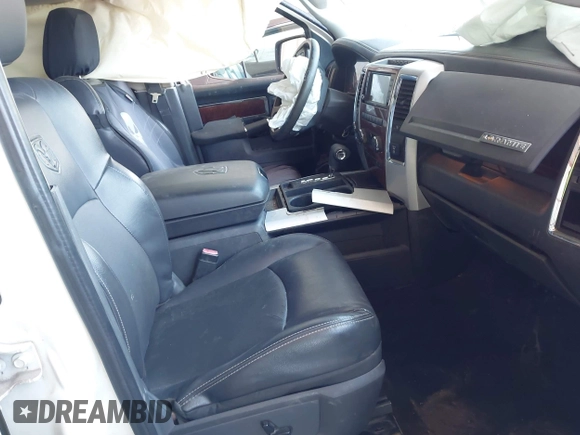 2009 Dodge 1500 Laramie z VIN 1D3HV13TX9J519720, wystawiony jako IAAI lot #42055968 z przebiegiem 190 226 mil mil oraz . Historia ofert i sprzedaży dostępna na DreamBid. Obrazek 5.