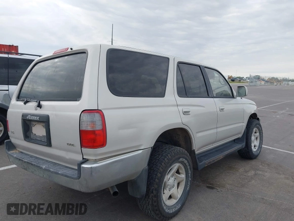 1997 Toyota 4Runner SR5 with VIN JT3GN86R0V0034665, listed as a IAAI auction lot 42316142 with 242,342 mi miles and . Bid and sale history available at DreamBid. Image 4.