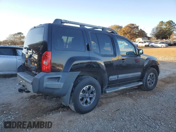 2014 Nissan Xterra X with VIN 5N1AN0NW9EN812437, listed as a Copart auction lot 83905504 with 118,805 mi miles and Salvage Title. Bid and sale history available at DreamBid. Image 3.