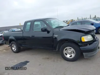 2002 Ford F-150 XL с VIN 1FTRX17242NB23323, выставлен на аукционе IAAI как лот 42363484 с пробегом Не указан миль и . История ставок и продаж доступна на DreamBid. Изображение 13.