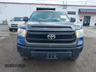 2014 Toyota Tundra SR with VIN 5TFUM5F17EX056082, listed as a IAAI auction lot 41884095 with 155,036 mi miles and . Bid and sale history available at DreamBid. Image 12.