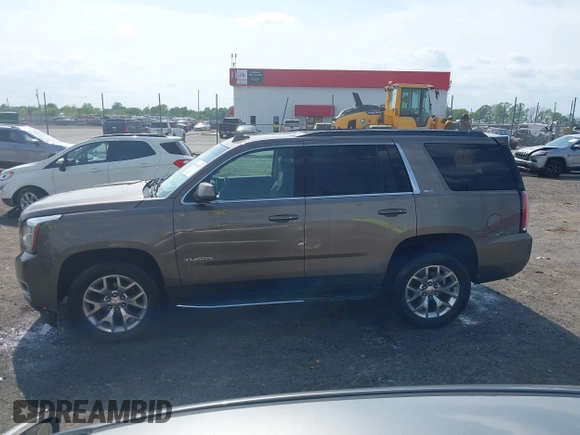 2016 GMC Yukon SLT with VIN 1GKS1BKC9GR328861, listed as a IAAI auction lot 42010839 with 200,711 mi miles. Bid and sale history available at carsss.com. Image 14.