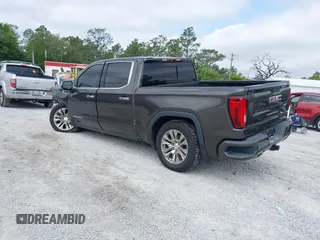 2019 GMC Sierra 1500 Denali z VIN 1GTU9FEL8KZ180128, wystawiony jako IAAI lot #42028488 z przebiegiem 78 015 mil mil oraz . Historia ofert i sprzedaży dostępna na DreamBid. Obrazek 3.