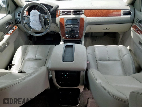 2014 Chevrolet Tahoe LT with VIN 1GNSCBE07ER239575, listed as a Copart auction lot 63094525 with 142,467 mi miles and Salvage title. Bid and sale history available at DreamBid. Image 8.