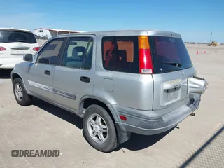 1999 Honda CR-V EX with VIN JHLRD1867XC060816, listed as a IAAI auction lot 41823958 with 220,322 mi miles. Bid and sale history available at carsss.com. Image 3.