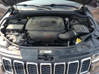 2021 Jeep Grand Cherokee Laredo E z VIN 1C4RJEAG7MC511092, wystawiony jako Copart lot #59144995 z przebiegiem 65 086 mil mil oraz Czysty tytuł • Clean title. Historia ofert i sprzedaży dostępna na DreamBid. Obrazek 12.