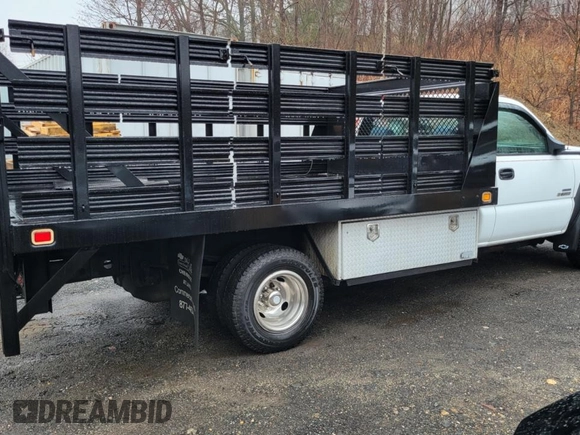 2007 Chevrolet Silverado 1500 with VIN 1GBJC34D67E167779, listed as a Copart auction lot 52091775 with 166,218 mi miles and Clean Title. Bid and sale history available at DreamBid. Image 4.