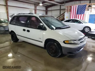 2000 Dodge Caravan with VIN 2B4GP25G4YR791420, listed as a Copart auction lot 83426754 with 141,635 mi miles and Salvage Title. Bid and sale history available at carsss.com. Image 4.