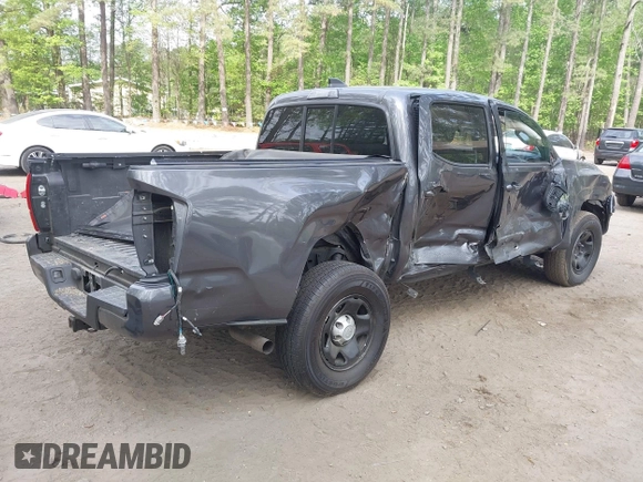 2022 Toyota Tacoma SR with VIN 3TYAX5GN1NT042099, listed as a IAAI auction lot 42081791 with 38,621 mi miles and . Bid and sale history available at DreamBid. Image 4.