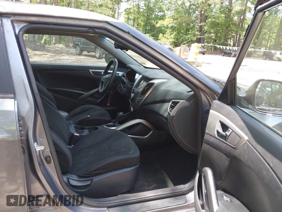 2012 Hyundai Veloster w/Black Int with VIN KMHTC6AD3CU078547, listed as a IAAI auction lot 42633915 with 143,633 mi miles and . Bid and sale history available at DreamBid. Image 5.