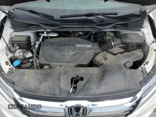 2020 Honda Odyssey Touring with VIN 5FNRL6H8XLB019365, listed as a Copart auction lot 52404335 with 59,486 mi miles and Salvage Title. Bid and sale history available at DreamBid. Image 12.