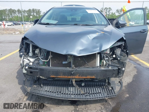 2019 Toyota Corolla L with VIN 2T1BURHE6KC223220, listed as a IAAI auction lot 42005148 with 121,736 mi miles and . Bid and sale history available at DreamBid. Image 6.