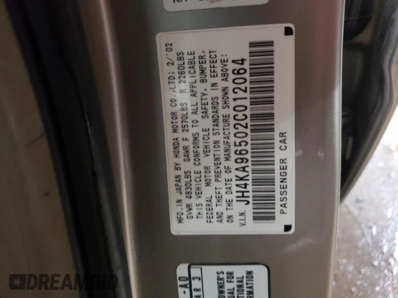 2002 Acura RL z VIN JH4KA96502C012064, wystawiony jako Copart lot #88080895 z przebiegiem 107 477 mil mil oraz Szkoda całkowita • Salvage title. Historia ofert i sprzedaży dostępna na DreamBid. Obrazek 13.