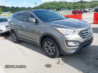 2014 Hyundai Santa Fe z VIN 5XYZUDLB4EG200834, wystawiony jako IAAI lot #42331334 z przebiegiem 129 710 mil mil oraz . Historia ofert i sprzedaży dostępna na DreamBid. Obrazek 1.