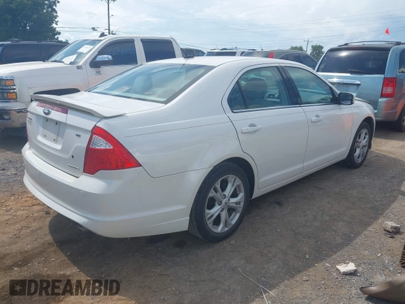 2012 Ford Fusion SE with VIN 3FAHP0HG8CR160797, listed as a IAAI auction lot 42619480 with 106,511 mi miles and . Bid and sale history available at DreamBid. Image 4.