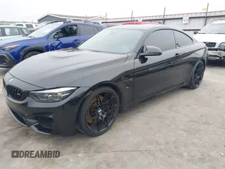2019 BMW M4 with VIN WBS4Y9C53KAH82910, listed as a IAAI auction lot 41570315 with 59,227 mi miles. Bid and sale history available at carsss.com. Image 23.