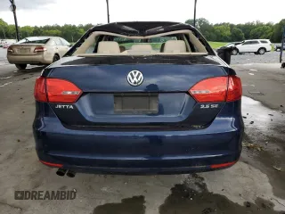 2013 Volkswagen Jetta SE with VIN 3VWDP7AJXDM379392, listed as a Copart auction lot 61598235 with 119,005 mi miles and Salvage title. Bid and sale history available at DreamBid. Image 6.