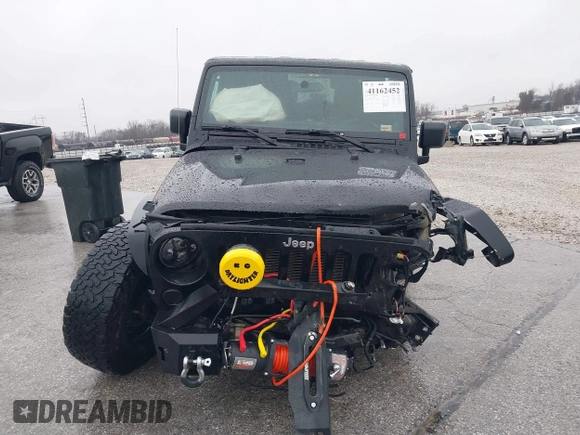 2012 Jeep Wrangler Rubicon with VIN 1C4BJWCG4CL106746, listed as a IAAI auction lot 41162452 with 134,911 mi miles and . Bid and sale history available at DreamBid. Image 13.