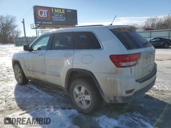 2012 Jeep Grand Cherokee Laredo with VIN 1C4RJFAG2CC267890, listed as a Copart auction lot 87832115 with 171,552 mi miles and Salvage Title. Bid and sale history available at carsss.com. Image 2.
