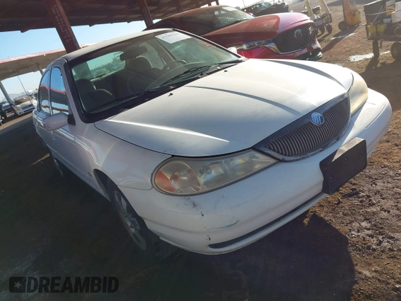 1998 Mercury Mystique z VIN 1MELM6539WK602026, wystawiony jako IAAI lot #41586256 z przebiegiem 134 707 mil mil oraz . Historia ofert i sprzedaży dostępna na DreamBid. Obrazek 1.