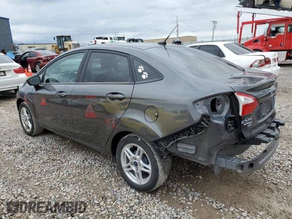 2018 Ford Fiesta SE z VIN 3FADP4BJ1JM115298, wystawiony jako Copart lot #76737564 z przebiegiem Nie podano mil oraz Szkoda całkowita • Salvage title. Historia ofert i sprzedaży dostępna na DreamBid. Obrazek 2.