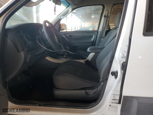 2006 Mazda Tribute i with VIN 4F2YZ02Z16KM17645, listed as a Copart auction lot 80996344 with 175,970 mi miles and Salvage Title. Bid and sale history available at carsss.com. Image 7.