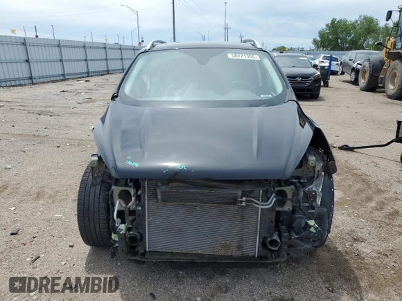 2018 Ford Escape Titanium with VIN 1FMCU9J95JUB31286, listed as a Copart auction lot 58721355 with 100,329 mi miles and Salvage title. Bid and sale history available at DreamBid. Image 5.