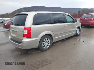 2014 Chrysler Town & Country Touring with VIN 2C4RC1BG2ER212233, listed as a IAAI auction lot 41836648 with 105,034 mi miles. Bid and sale history available at carsss.com. Image 4.